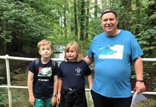 Sharon's husband and children in the forest