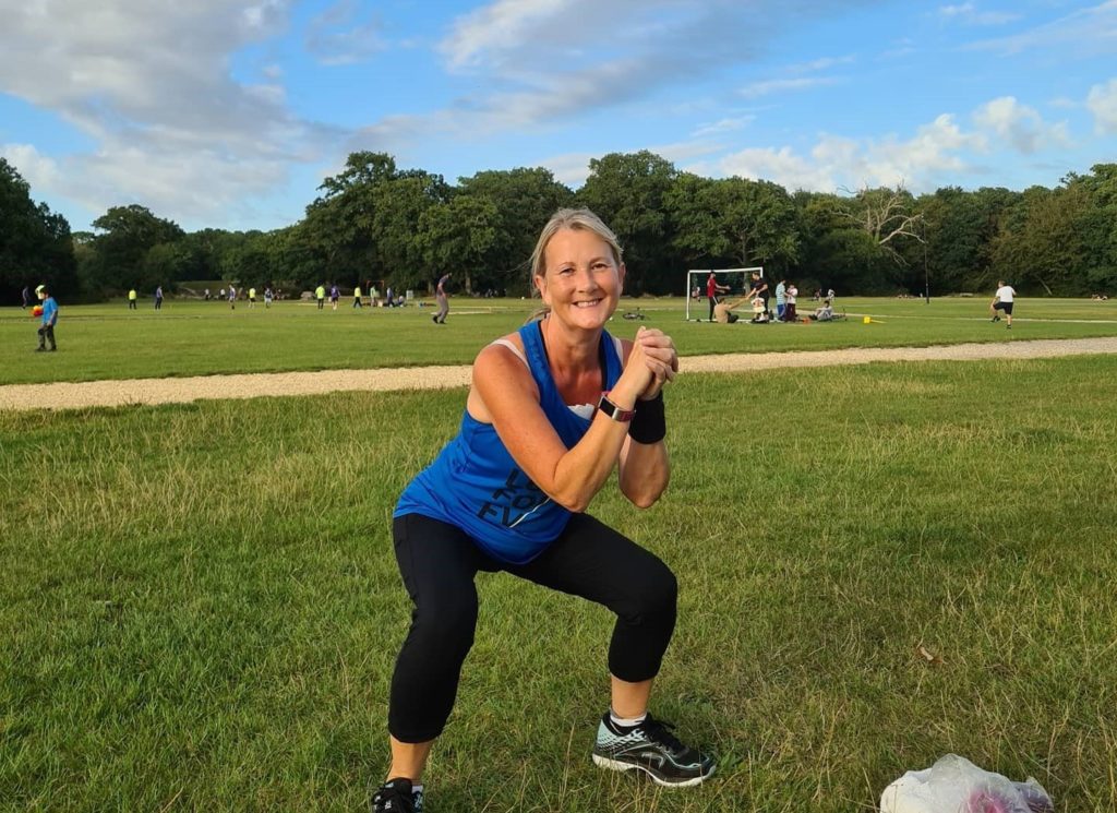 Carole smiling at a bootcamp