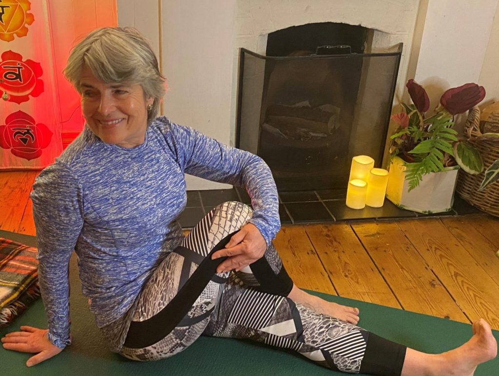 Jocelyn teaching a yoga low-income class