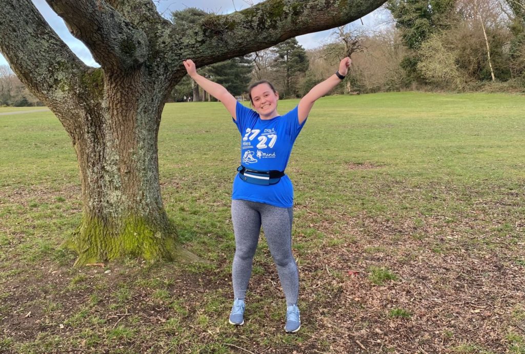 Georgia celebrating completing 27 miles after over coming her running anxiety.