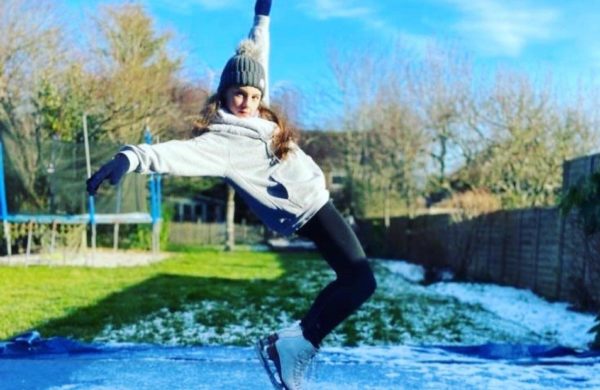 Ava skating on a homemade ice rink in her garden during lockdown