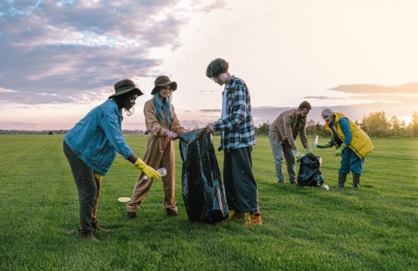 People of all ages outdoors litter picking