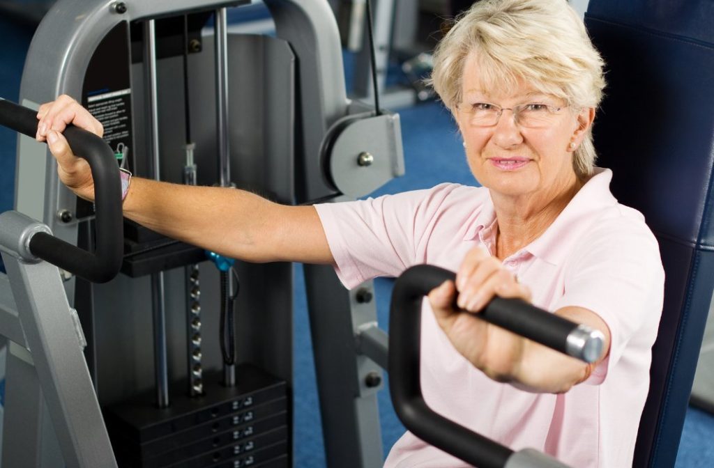 Women doing gentle exercise on a machine (Active Nations)