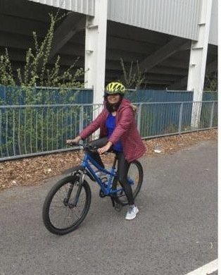 Sindhu cycling after learning to ride a bike