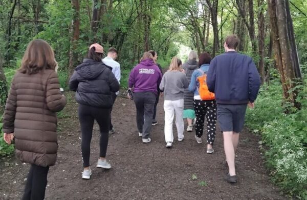 A group of people walking.
