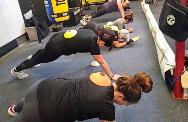 Women doing planks.