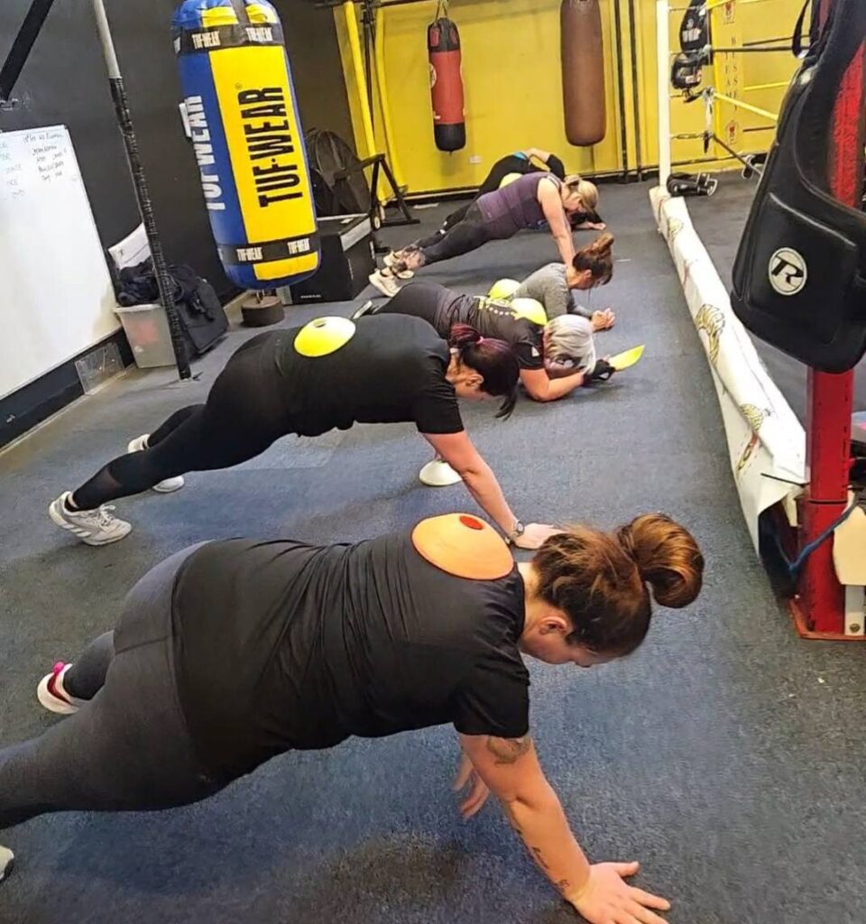 Women doing planks.