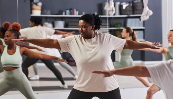 A woman in a yoga class.