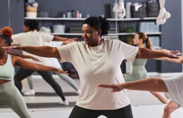 A woman in a yoga class.
