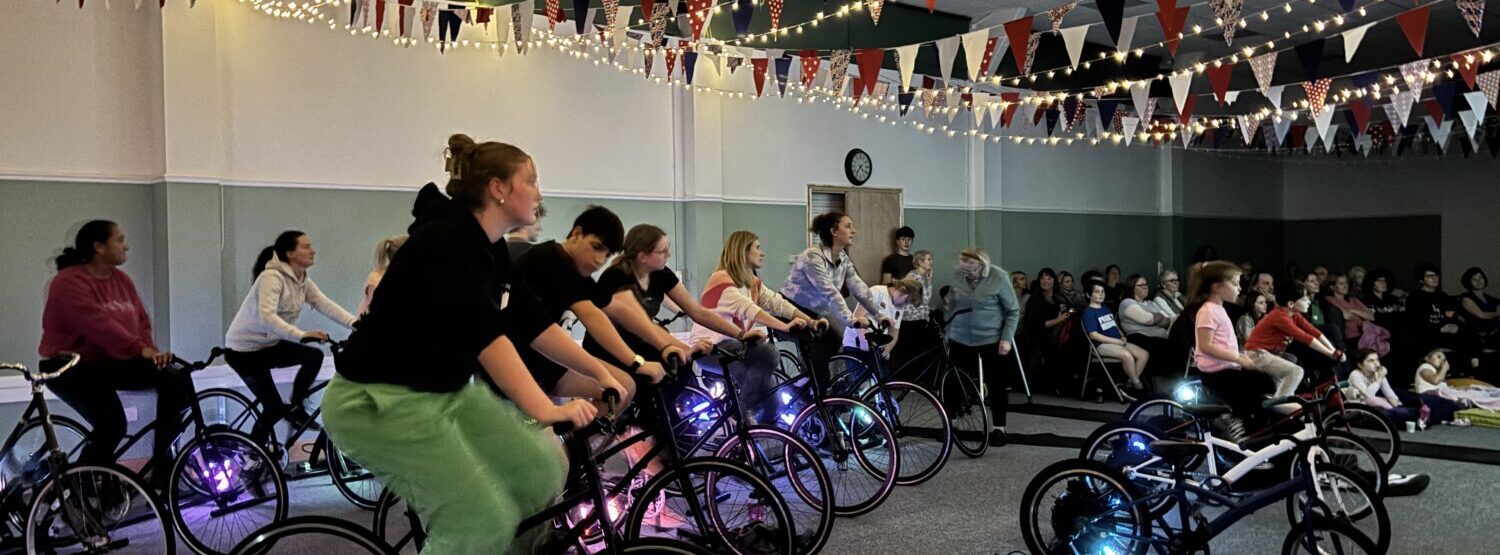 People on indoor bicycles.