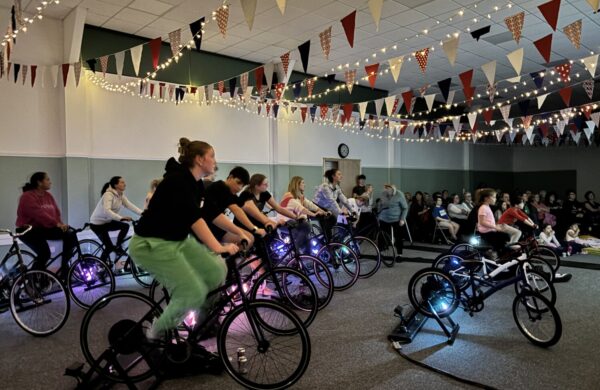 People on indoor bicycles.