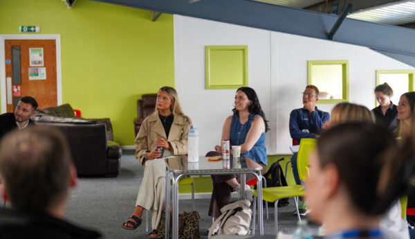 A room of people learning.