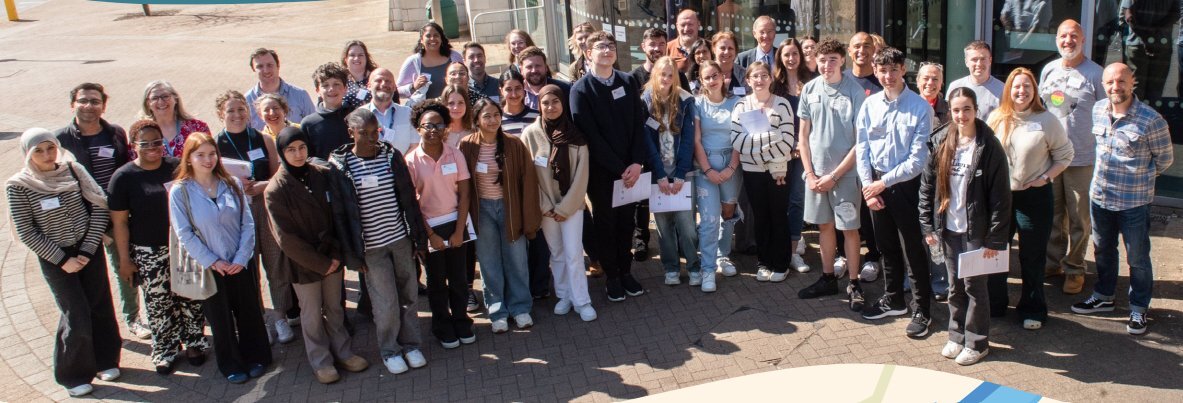 Group of people standing on the street amling.